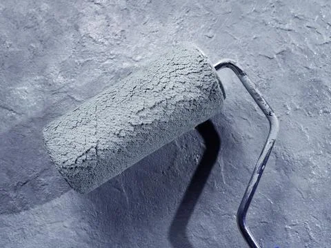 Wall blackground with paint roller Stock Photos