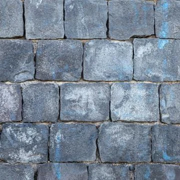 Wall in blocks of volcanic stone Stock Photos