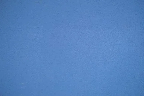 Wall of blue rough embossed building decorative stucco. Texture, background Fotos de archivo