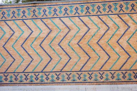 Wall with blue tiles pattern Wall with blue tiles pattern mosaic. Samarkan... 스톡 사진