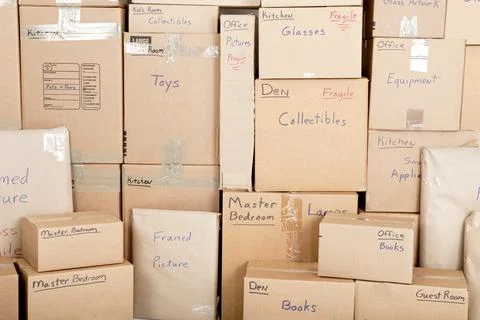 Wall with boxes labeled and ready for shipping Stock Photos