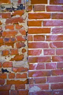 Wall of bricks of different shape and colour wall of bricks of different s... Stock Photos