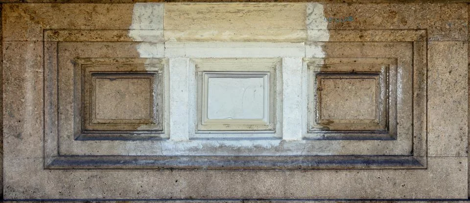 Wall with bricks in the shape of a diamond, with a part of different color. Stock Photos
