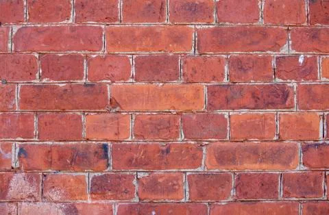 The wall of the building is made of old white brick. Background for text Stock Photos