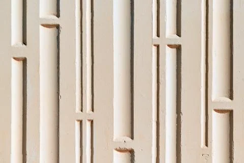 Wall of the building with a relief surface. Stock Photos
