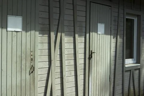 The wall of the building. The surface of the wall of the house. Stock Photos