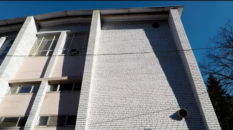 Wall of the building of white brick with windows Stock-Footage 128291987