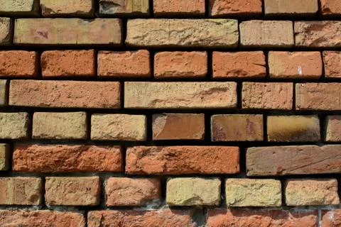 Wall built of brick Stock Photos