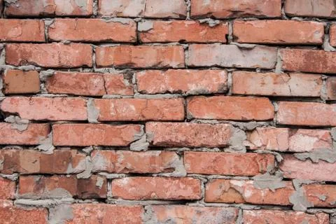 Wall built of red brick Stock Photos