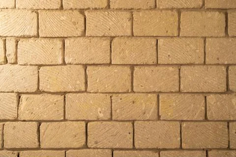 Wall built of stone blocks of tuff Stock Photos