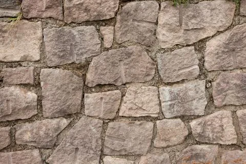 A wall built up with stones Stock Photos