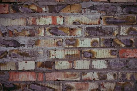 A wall of burnt brick Stock Photos