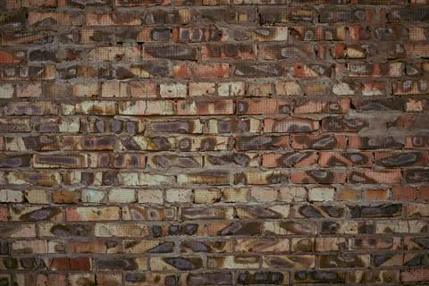 A wall of burnt brick Stock Photos