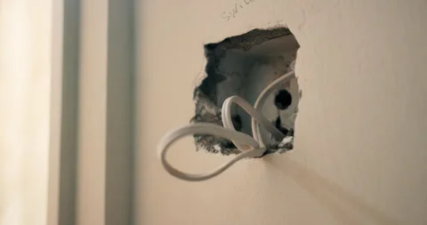 Wall, cable and open with outlet for electrical work, protection or wiring Stock Footage 337151551