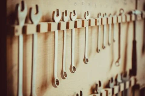 On the wall in the carpentry workshop victpria wrenches Stock Photos