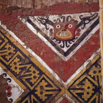 Wall carving of the sun god with face, bird, and snake motif at El Brujo ar.. Stock Photos