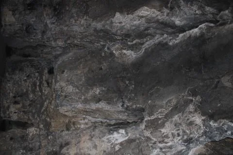 Wall of a cave Stock Photos