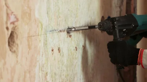 Wall chasing a groove in the wall for cable routing. 2 Shots. Stock-Footage 219948233