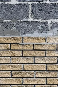 Wall cladding with decorative bricks, front view. Material for decorating the Fotos Stock