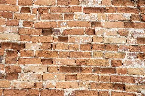 Wall with clay brick Stock Photos