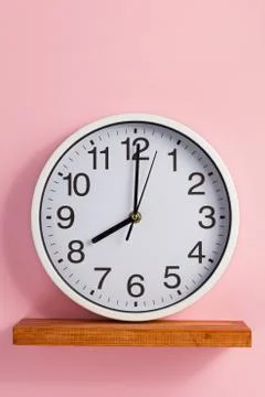 Wall clock at abstract background Stock Photos