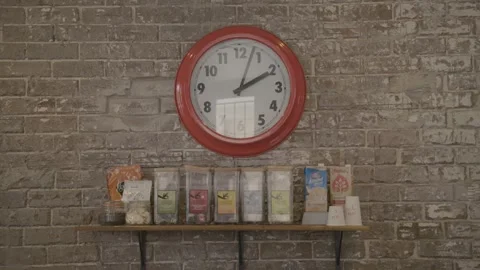 Wall Clock and Tea Display on Brick Wall in Sydney Cafe Interior Stock Footage 345671525