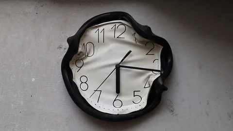 Wall clock burned and melted by fire in a burnt kitchen and failing time Stock Footage 125099538