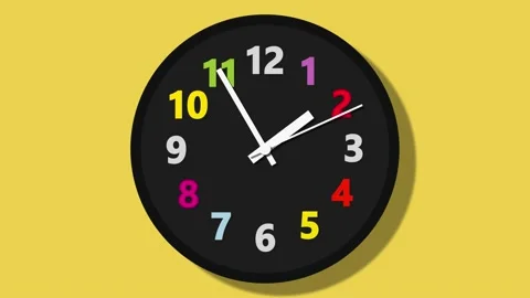 Wall clock with colorful numbers Stock Footage 144202834