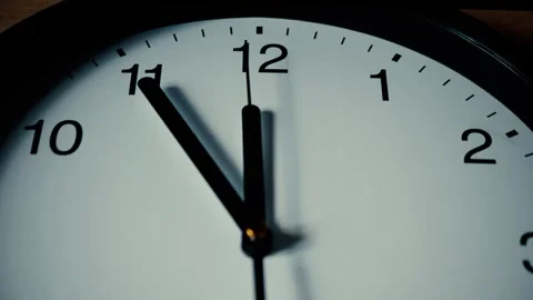 Wall clock dial. Second arrow hand moves counterclockwise back from twelve. Time Stock Footage 277360764