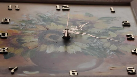 Wall clock with a flower still life Stock Footage 88703709