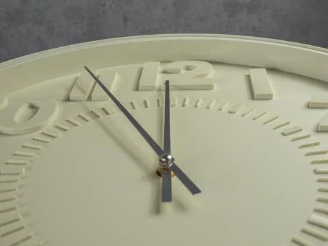 Wall clock on a gray background. Clock close up. Stock Photos