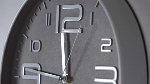 Wall clock on a gray background. Time laps 動画素材 121859681