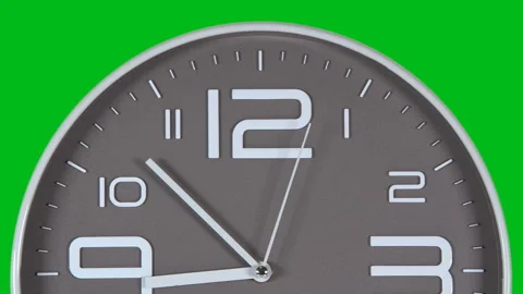 Wall clock on a green background. Time laps 動画素材 141370927