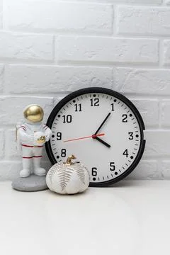 Wall clock isolated on white background Stock Photos