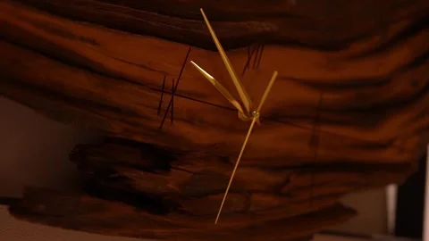 Wall clock in live edge wood with gold hands and tally marks detail Stock Footage 331956376