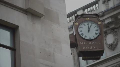 Wall Clock Michael House London - flagship store of Marks and Spencer Stock Footage 93203440