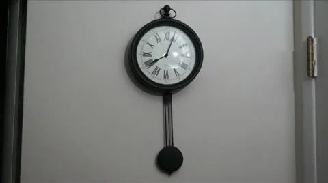 Wall Clock with Pendulum Stock Footage 21855063