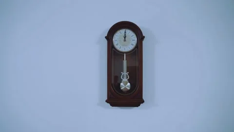 Wall clock with pendulum Stock Footage 164990937