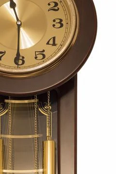 Wall clock with pendulum Stock Photos