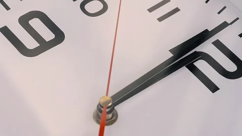 Wall clock second hand crossing 12 o'clock 스톡 동영상 336684864