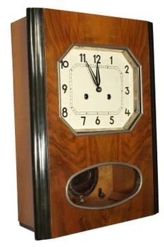 Wall clock showing five to twelve Stock-Fotos