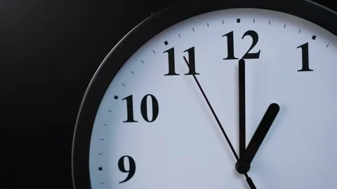 Wall clock showing time. Analog clock face at one o'clock Stock Footage 339590066
