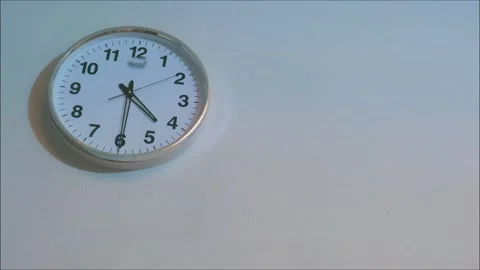 Wall Clock Showing Time on Minimal White Wall – Time Management and Copy Space Видео 329542087