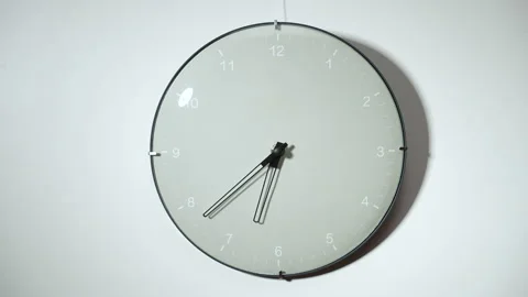 Wall clock on a white background. Time lapse Stock Footage 167714457