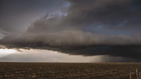 Wall cloud rolling over the landscape in dark dramatic storm Stock Footage 120154144