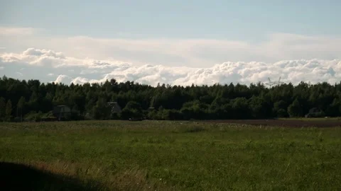 A wall of clouds over the forest, dense, dense clouds Stock Footage 208340415
