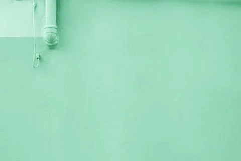 Wall colored with mint or green color. Stock Photos