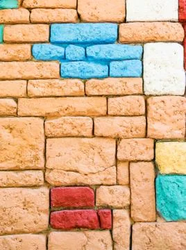 Wall of colored stones. Stock Photos