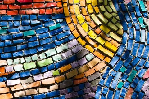 Wall of colorful bricks with shadows Stock Photos