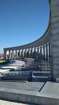 Wall of columns in the park Stock Photos